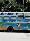 A bus fitted as a mobile bathroom painted with scenes of Pattaya beach.