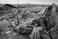 Lahti's family tent has been destroyed by a night storm. She will sleep in the neighbours' tent until her parents can build a new shelter.