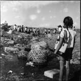 12) A school girl on her way to school, Din Daeng dump site, 1958