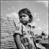 16) A little girl at Din Daeng Garbage Mountain, 1958