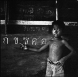 19) A student at Din Daeng slum school, 1958